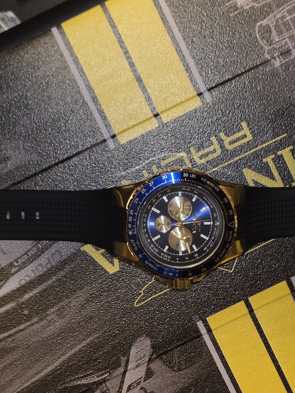 Invicta Gold-Tone Chronograph Watch with Blue Dial and Black Strap